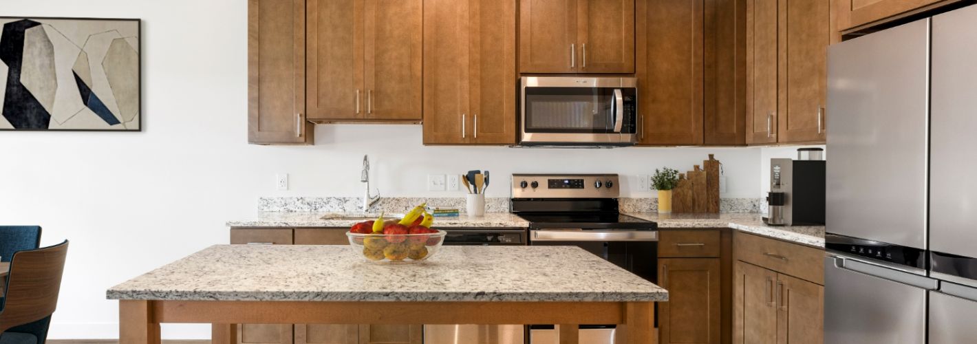 Aspen at Melford Town Center : Kitchens with elegant finishes and stainless steel appliances