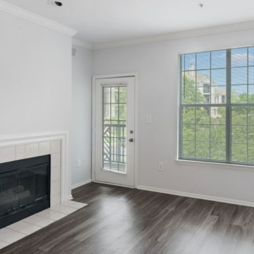 Vacant apartment with fireplace