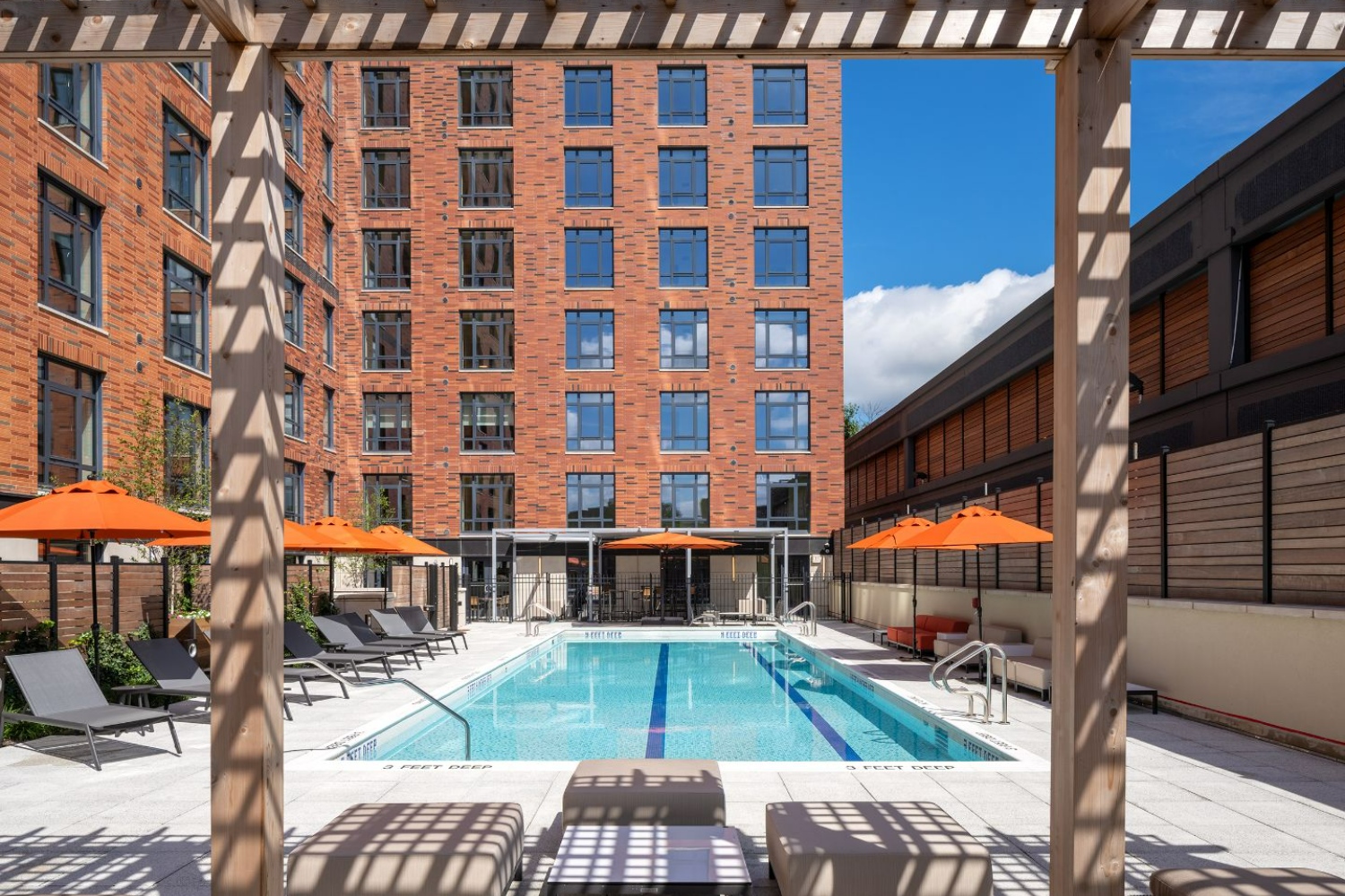 Heated pool with shaded pergolas