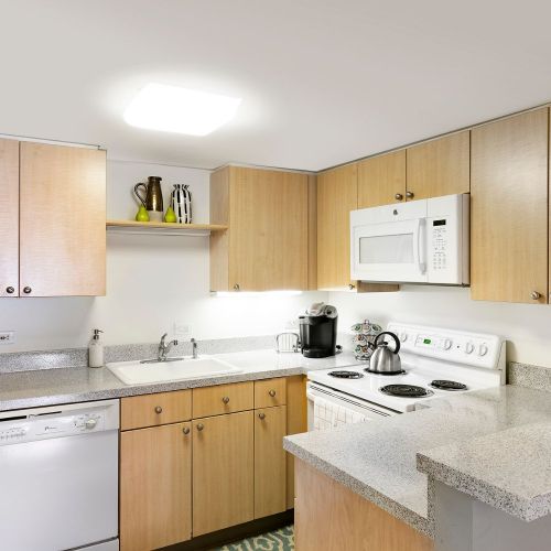 Revel in our open kitchen designs with ample counterspace to cook. 