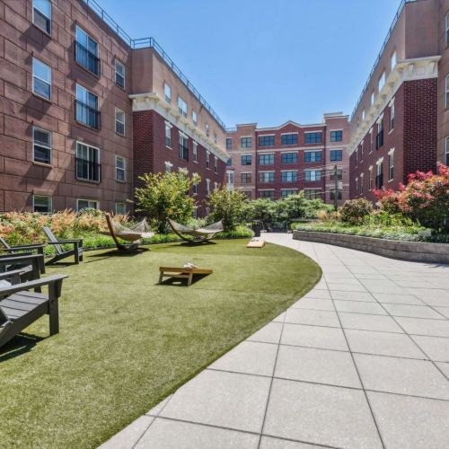 Outdoor seatings with cornhole