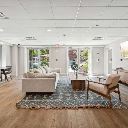 Resident community room with lounge seatings and TV
