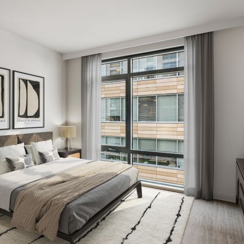 Wood-style, luxury flooring throughout bedroom and living spaces