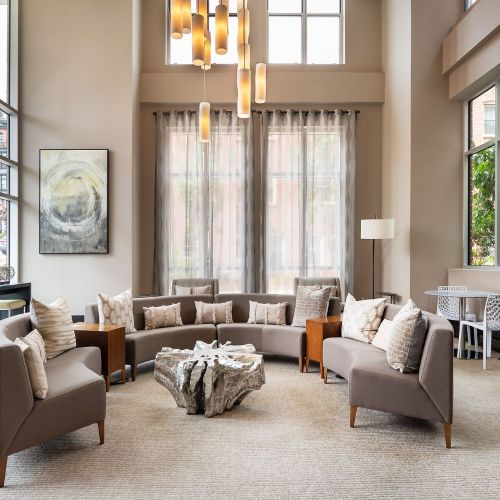 Experience a warm welcome from our open-air living room lobby. 