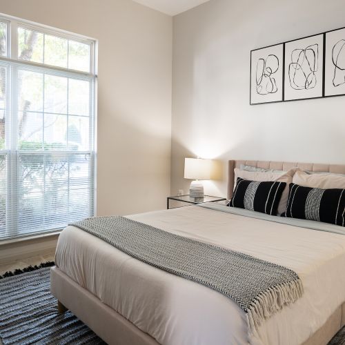 Experience a cozy and comfortable bedroom within our guest suite 	