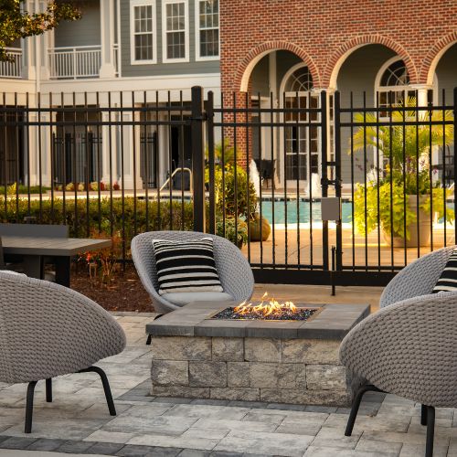 Cozy courtyard conversations around the firepit 