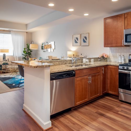 Gourmet kitchens with stainless steel appliances, granite countertops, and cherry wood cabinets.