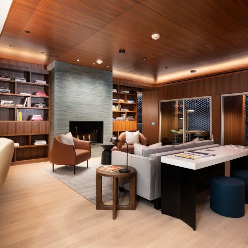 Intimate Library with private booths & lounge seating.