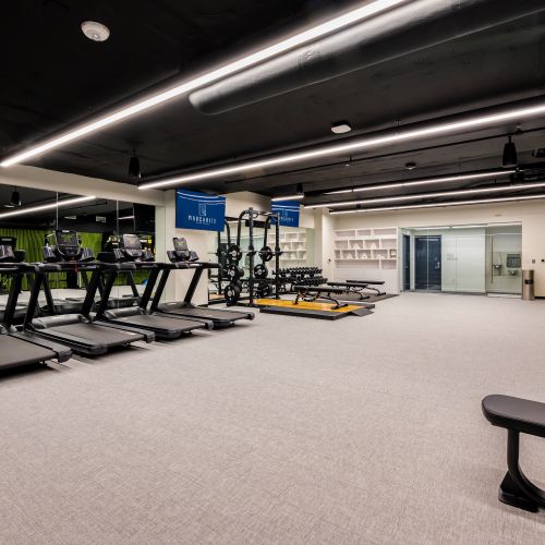 Fitness Centre with Peloton Bikes and private Yoga Studio.