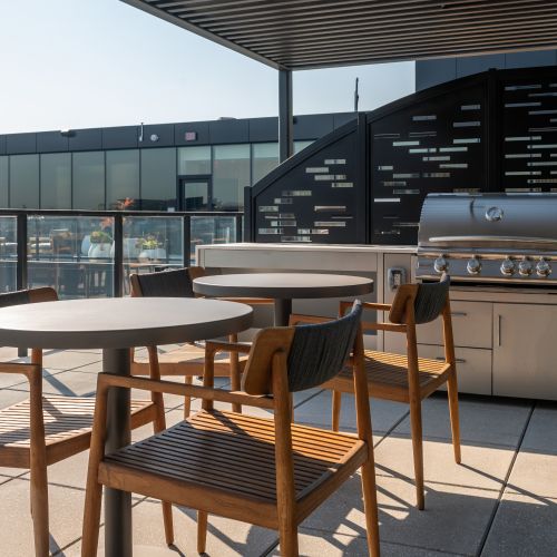 Rooftop lounge with ample seating.