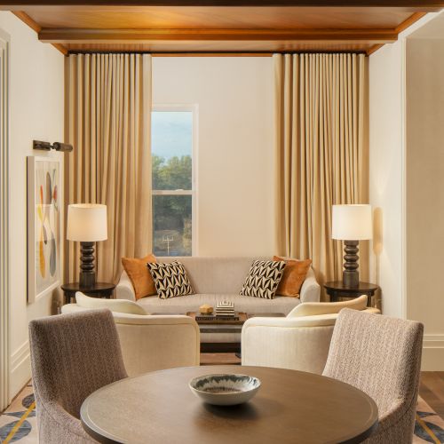 Amenity spaces fitted with cozy couched and tables to work and connect