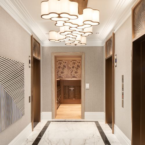 Gold finishes accent the lobby area at The Claude