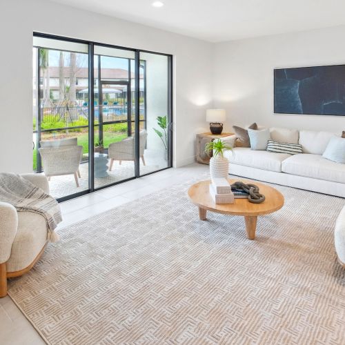 Settle into your living room for a quiet night in or gather with loved ones in this flexible space. 	