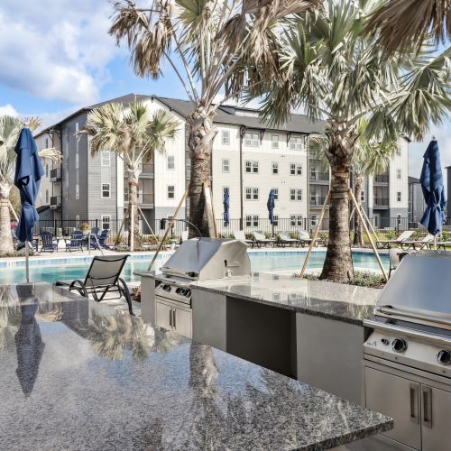 Resort-style pool and grilling stations.	