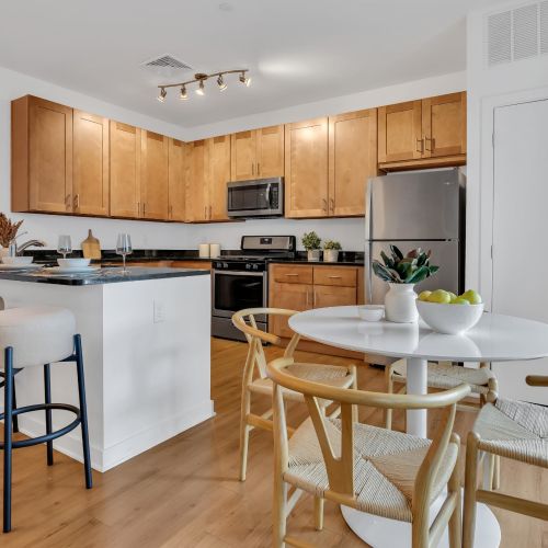 Dining area looking toward kitchen and island seating	