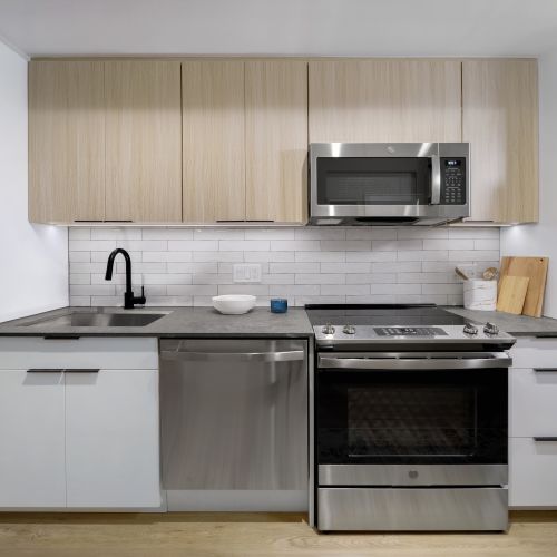 Embrace spacious kitchens with quartz countertops and stainless steel appliances.	