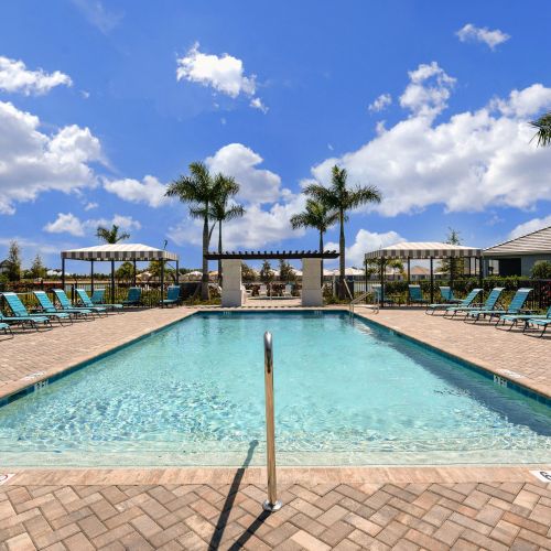 Lounge by the resort-style pool with an abundance of seating	