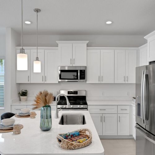 Timeless quartz countertops throughout	