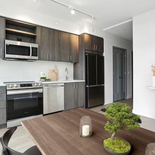 Bright kitchen spaces featuring slate grey cabinetry