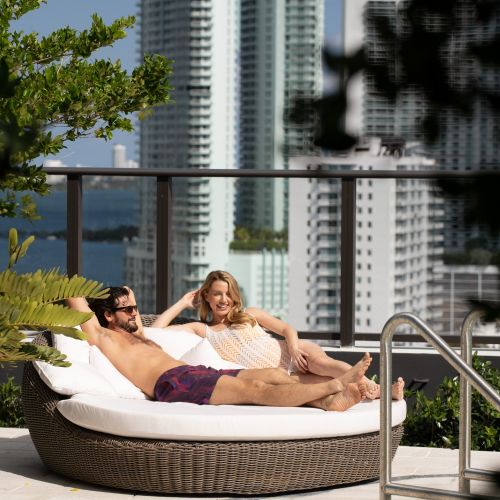 Sunny rooftop resort style pool and lounge