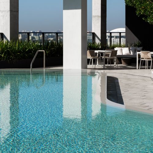 Rooftop resort style pool with outdoor lounge