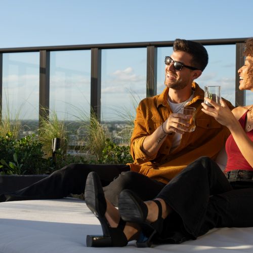 Enjoy sunsets on the rooftop lounge
