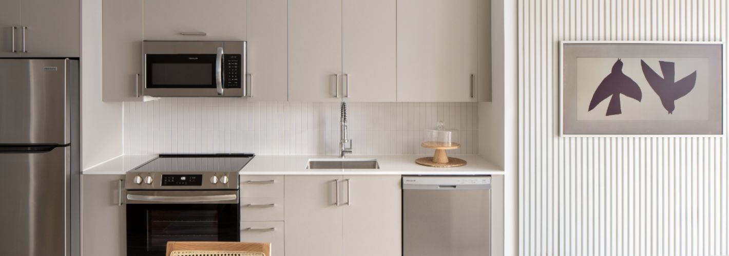Wynwood Haus : Modern kitchens with quartz countertops and porcelain tile backsplash