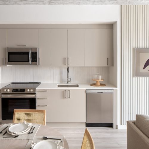 Modern kitchens with quartz countertops and porcelain tile backsplash