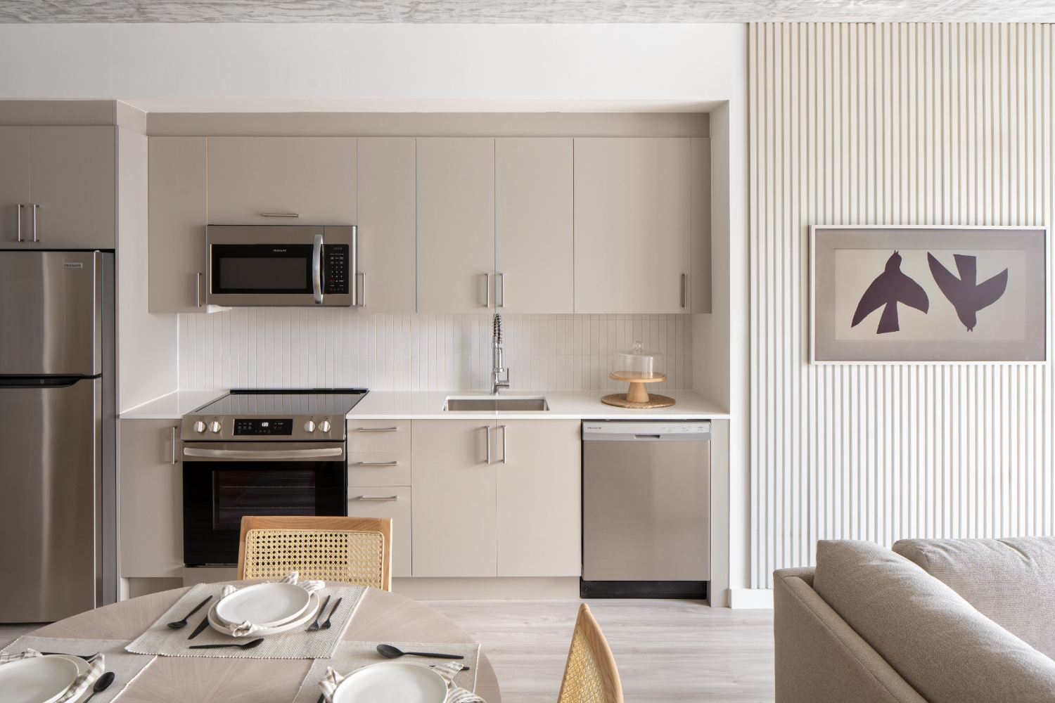 Wynwood Haus : Modern kitchens with quartz countertops and porcelain tile backsplash