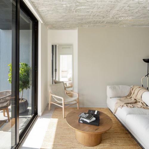 Living room space leading out to balcony