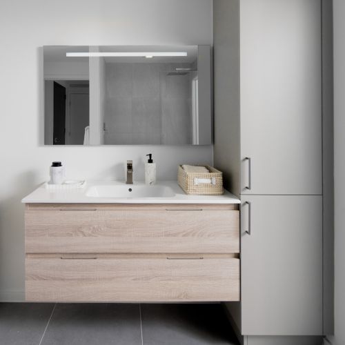 Bathrooms with large vanitys and additional storage cabinets
