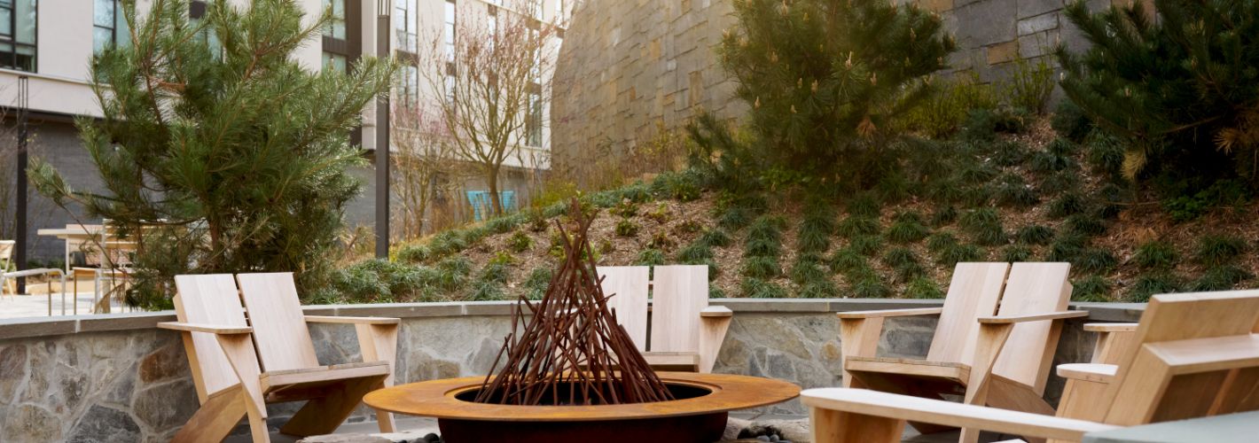 The Astrid : Fire pit areas complete the perfect summer evening or night	