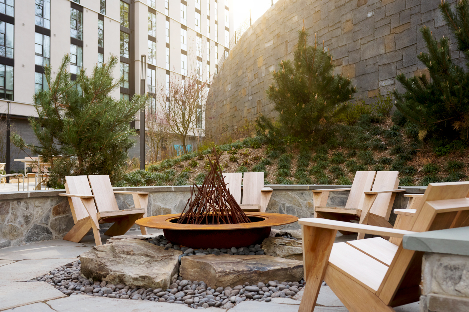 The Astrid : Fire pit areas complete the perfect summer evening or night	