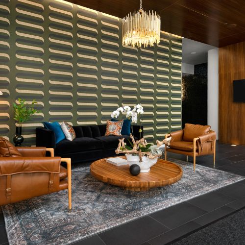 Our residential lobby greets you with elegant ambiance, where every detail says 'welcome home.' 	