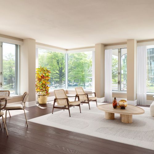 Choose your comfort: elegant hardwood or cozy carpeted floors for the perfect living room ambiance.