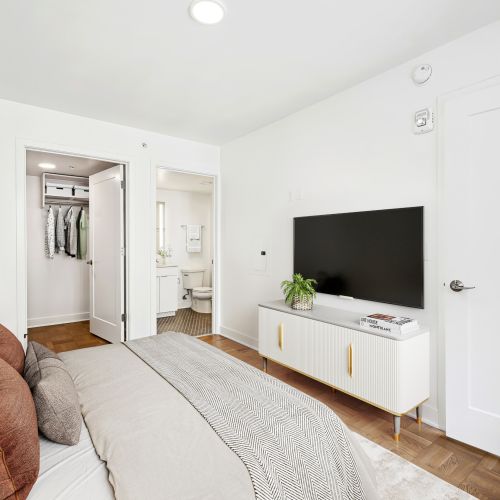 Custom storage shelving in our bedroom closets makes organization effortless	