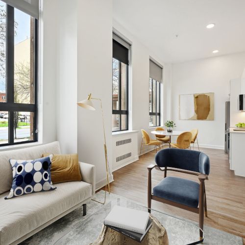 Sleek under-cabinet kitchen lighting illuminates every corner, creating a cozy ambiance for gatherings.	
