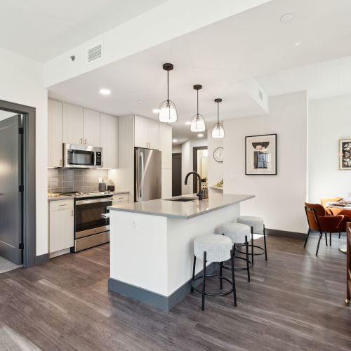 Apartment kitchen and dining showing entry to bedroom