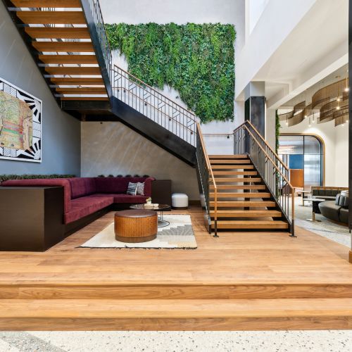 Lobby featuring a grand staircase and seating