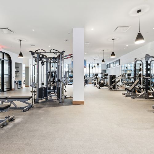 Fitness center featuring strength training equipment