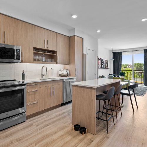 Quartz countertops lay the foundation for an extraordinary culinary experience. 	