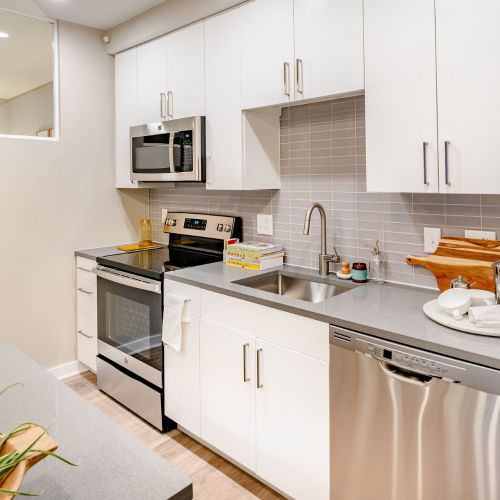 Kitchen with stainless steel appliances 	