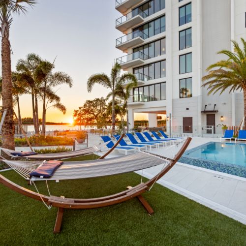 NOVEL Beach Park pool sunset with hammock