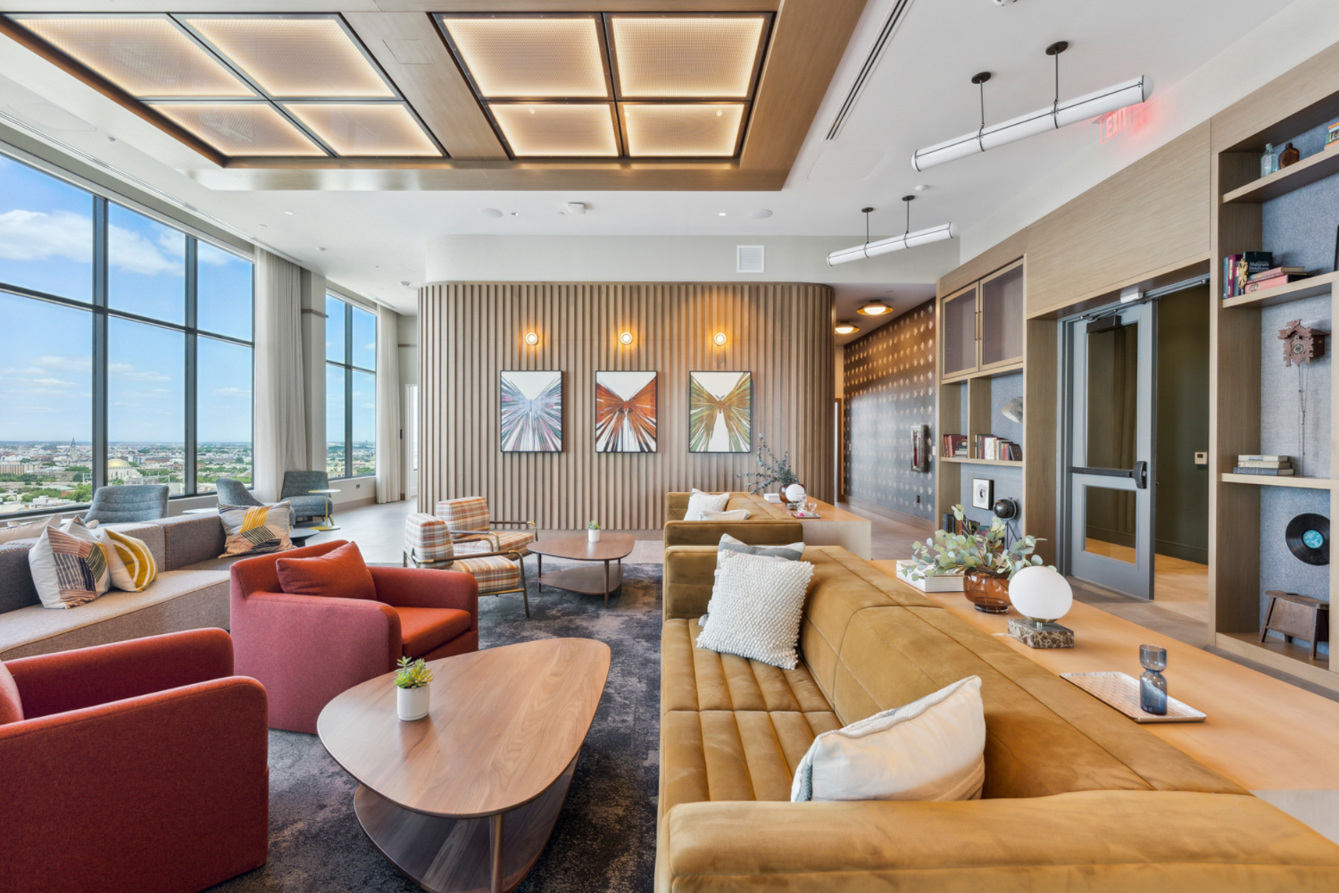 Rooftop lounge with ample seating and view of city	