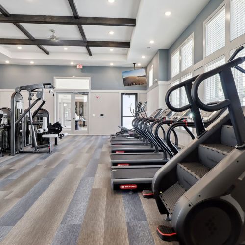 Fitness center with cardio and strength training equipment