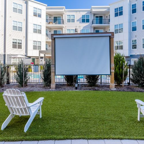 Area for outdoor movies with lawn chairs	