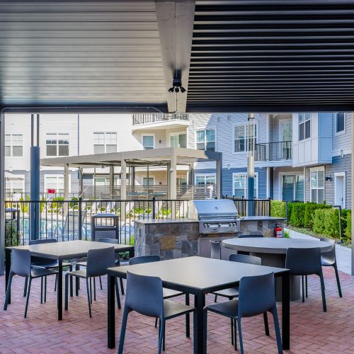 Covered outdoor dining area and grills	
