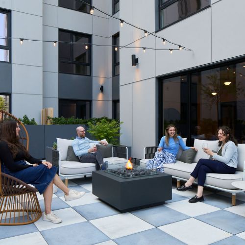 Keep warm with friends by the firepit	