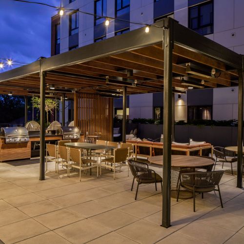 Outdoor terrace brightly lit in the evening	