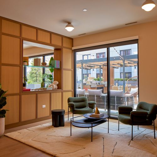 Lounge and game room looking out to the outdoor terrace	